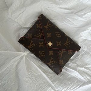 Louis Vuitton Monogram Medium Kirigami Wallet. Gently used as is.